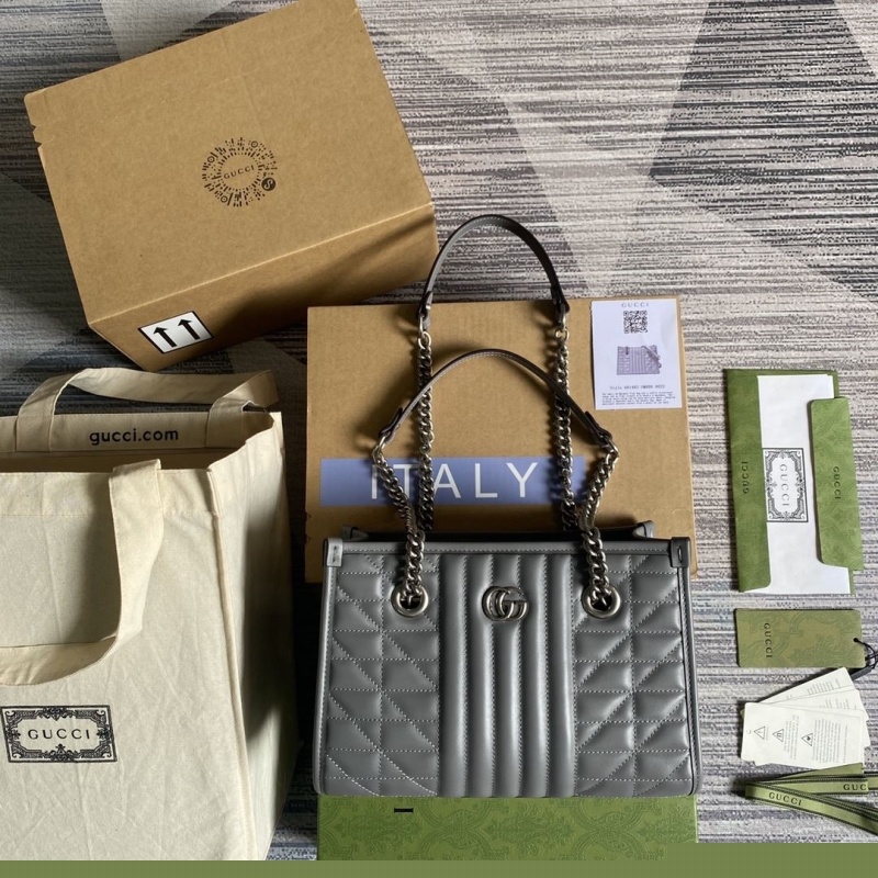 G*u*i shopping bags